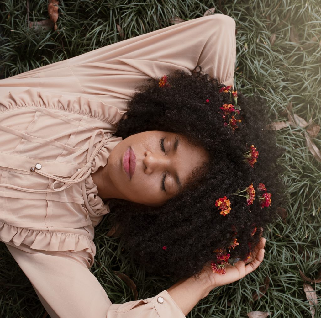 top view woman posing romantic garden
